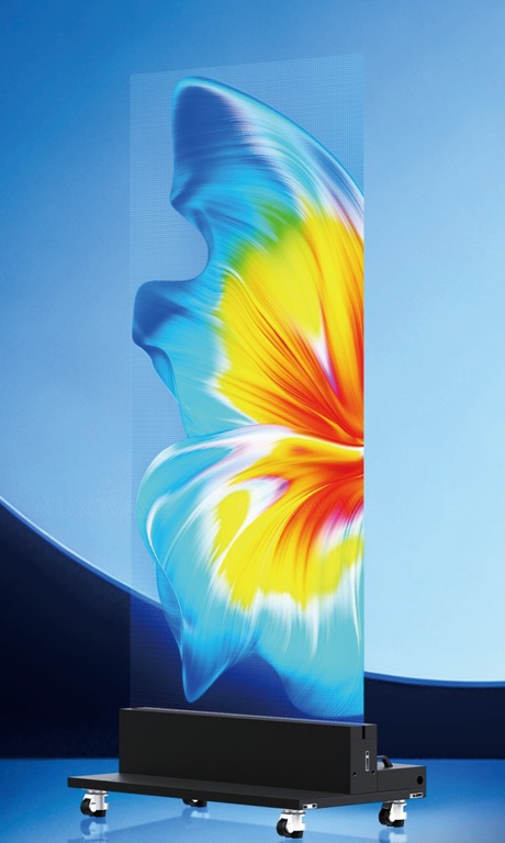 Free-standing transparent LED kiosk on a wheeled base showing floating color content